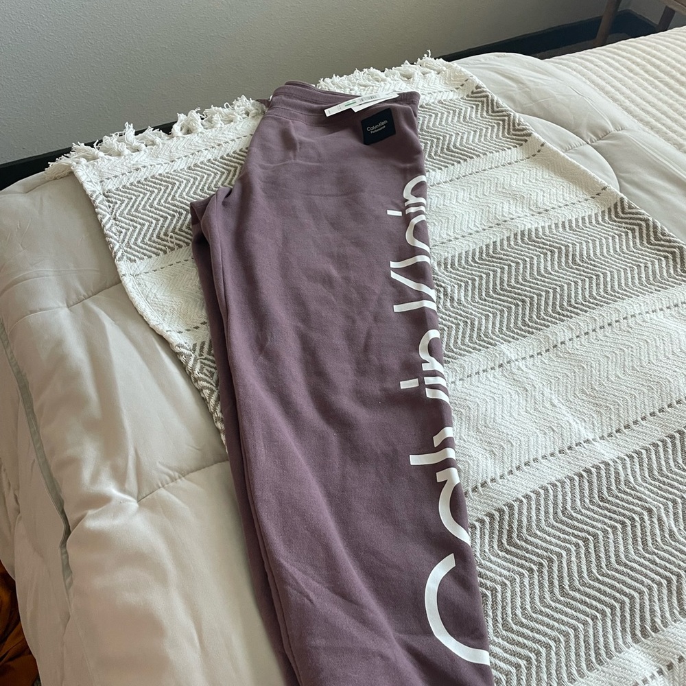 Purple Calvin Klein sweats